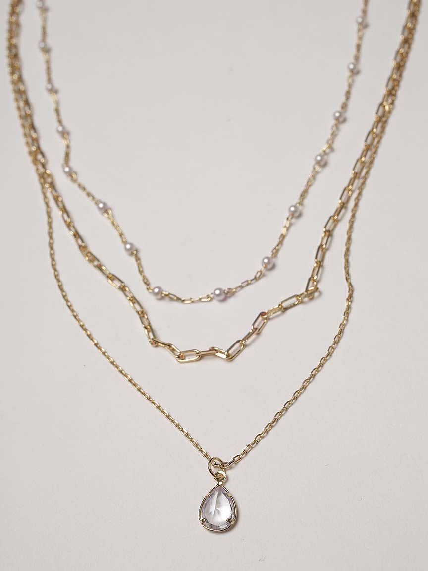 layered pearl and gem necklace