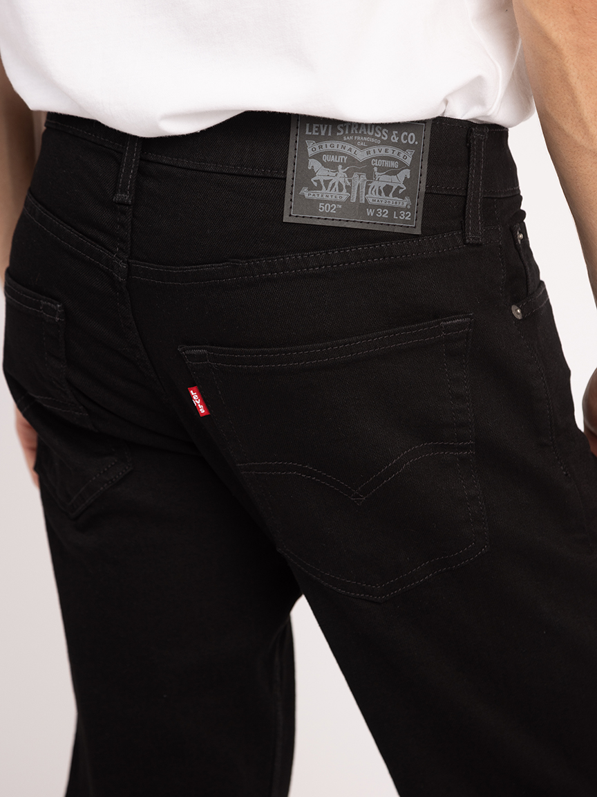 502 taper leg jean black